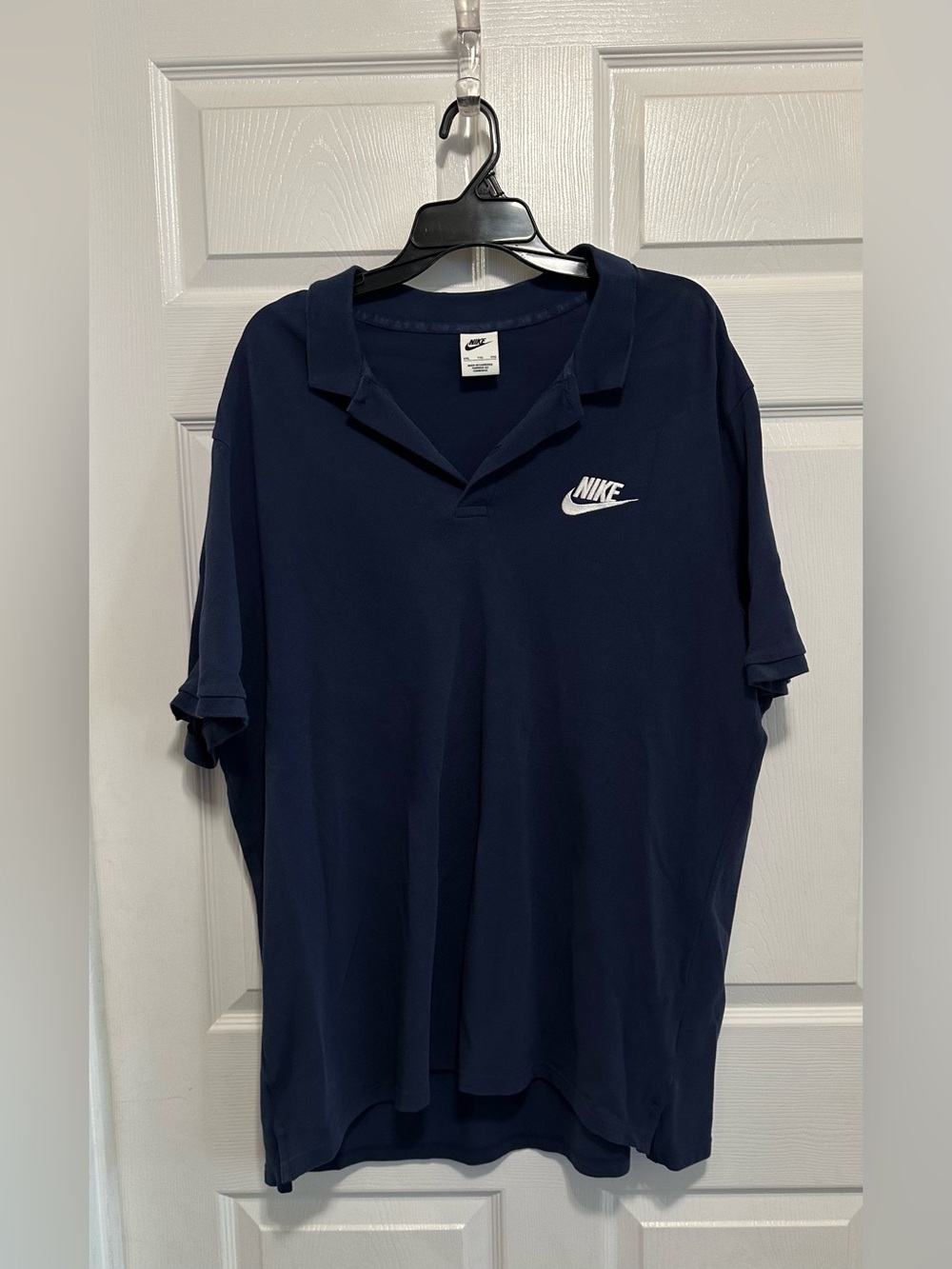 Nike Men’s Dark Navy Polo with White Swoosh